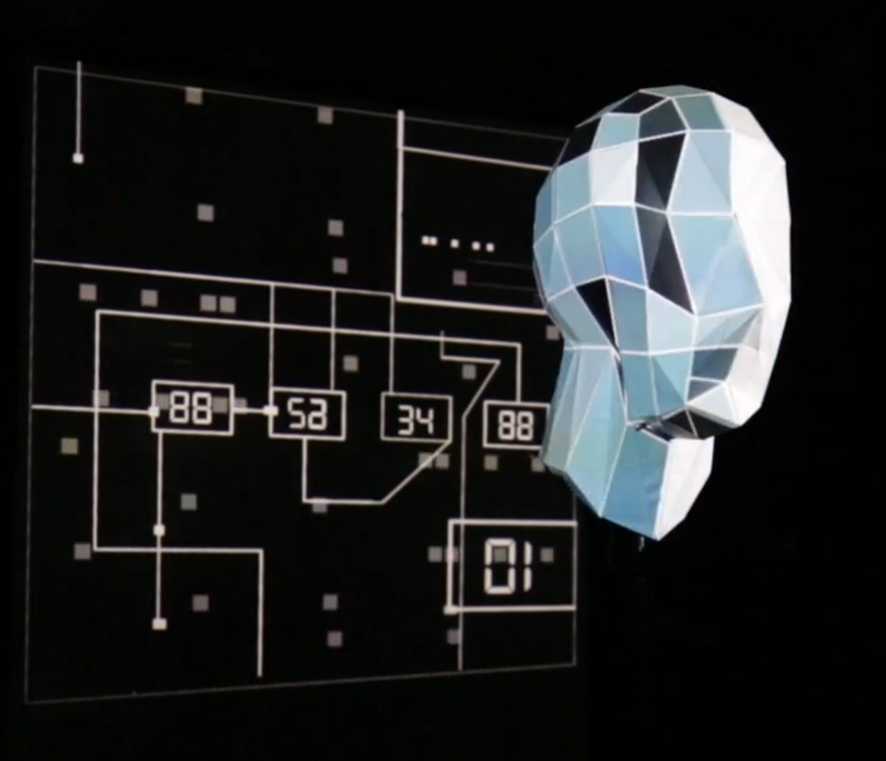 projected head in front of a screen